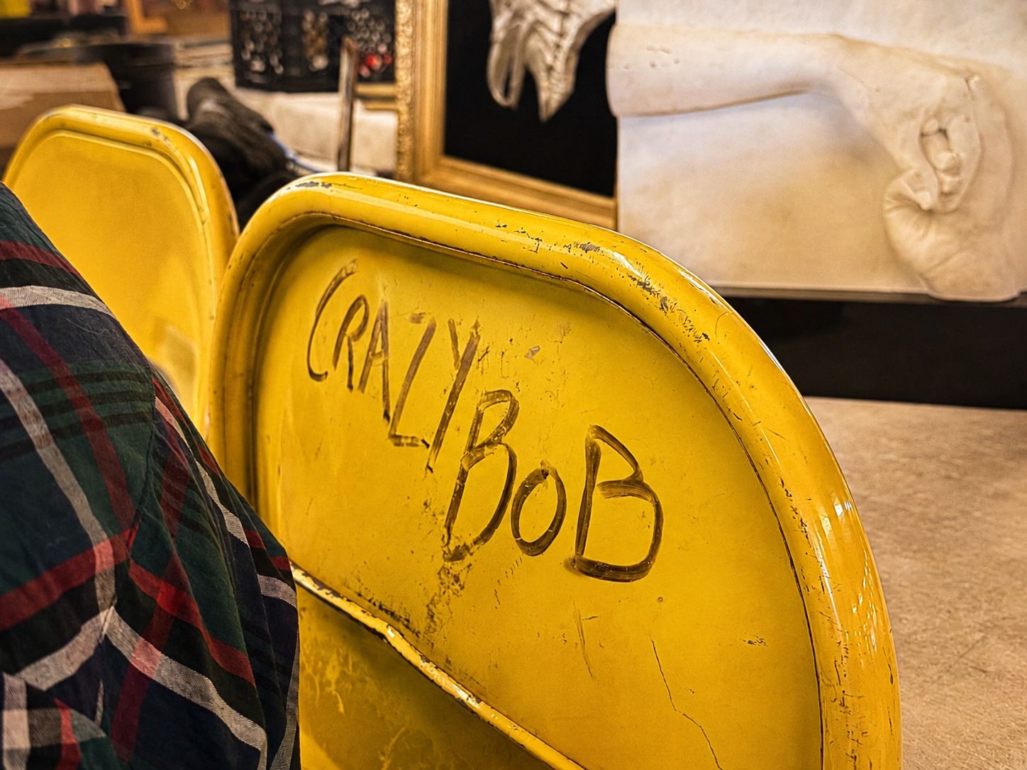 Royal Oak Antiques Market: The People Behind a Sunday Tradition 5 Yellow chair marked Crazy Bob at the Royal Oak Antiques Market
