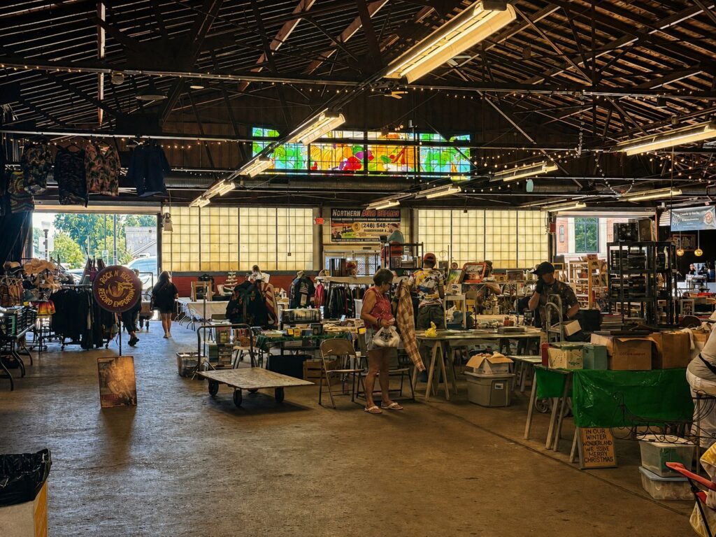 Royal Oak Antiques Market: The People Behind a Sunday Tradition 2 Shoppers browsing vendor booths inside the Royal Oak Antiques Market